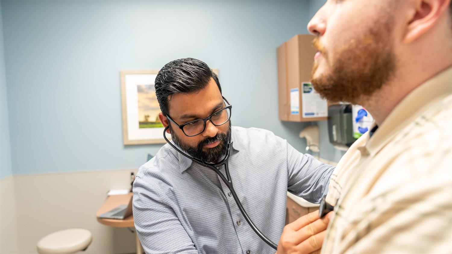 Doctor preforming test on patient